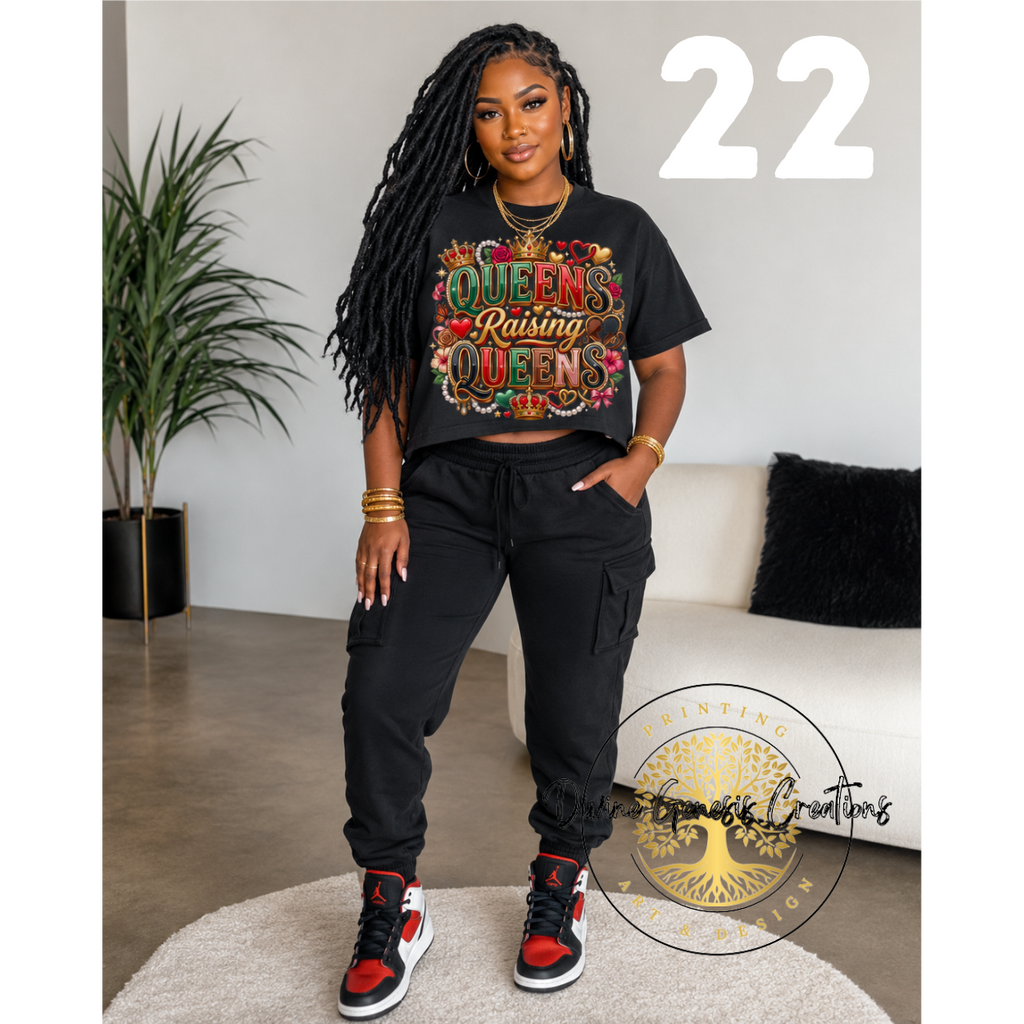Woman wearing a black t-shirt with colorful text and black pants in a living room setting.