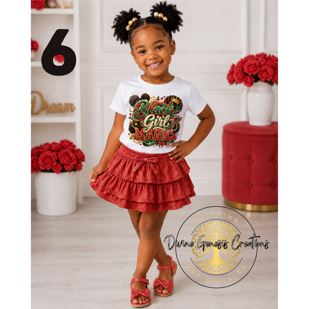 Young girl wearing a 'Black Girl Magic' shirt with red skirt and sandals in a decorated room.