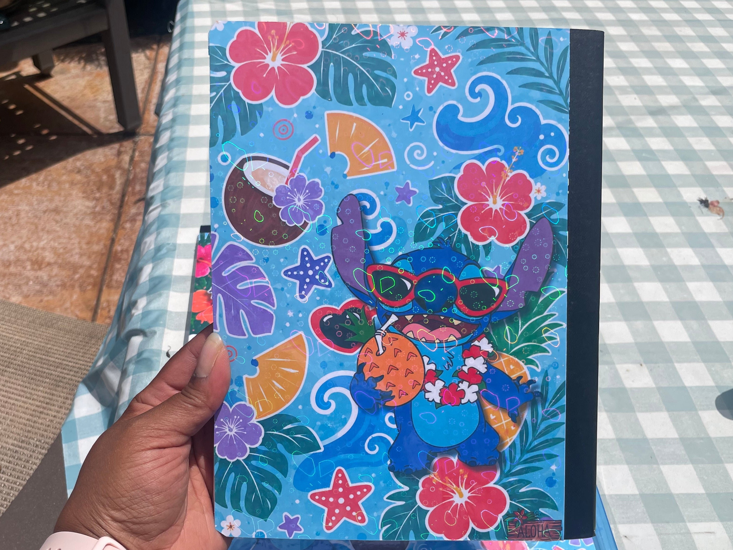 Personalized Composition Book featuring a colorful cartoon character and tropical floral designs